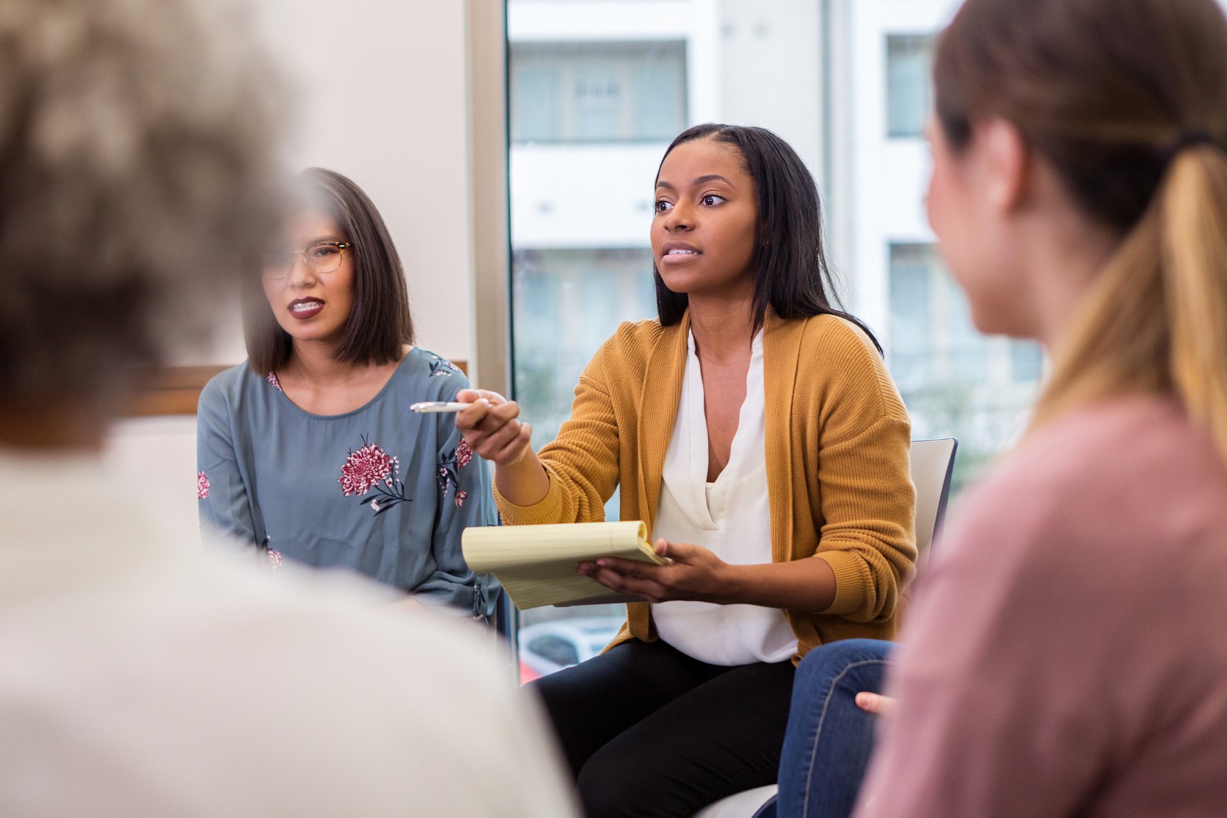 Counselor leads discussion group